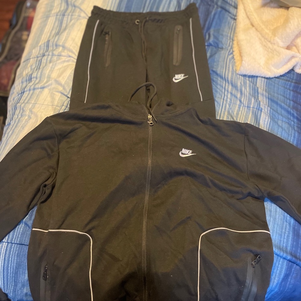 Brand new Nike jogging suit  black pants and jacket